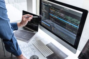 developer programmer working on project in softwar GGMTFY5 scaled 1