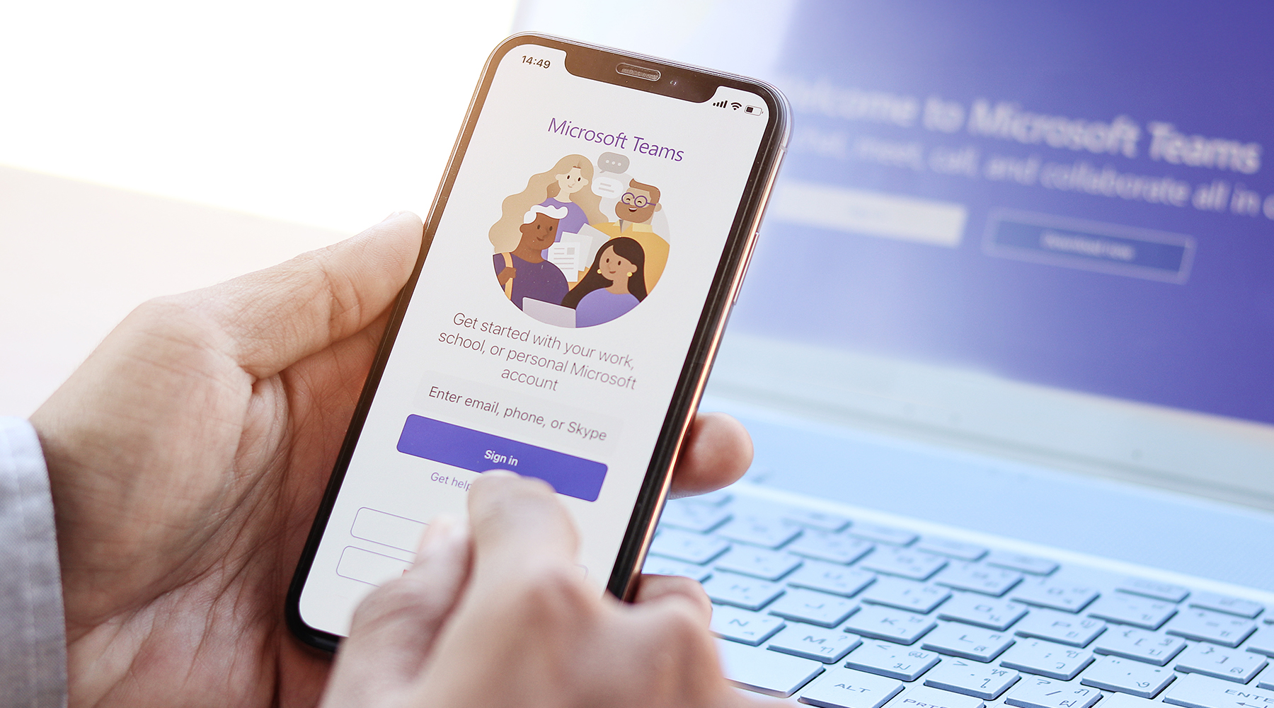 cell phone showing login screen for Microsoft Teams